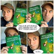 Jason Platt with pictures of his book in comic book layout